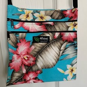 Crossbody bag with Hawaiian print. 8x8” 48” strap.